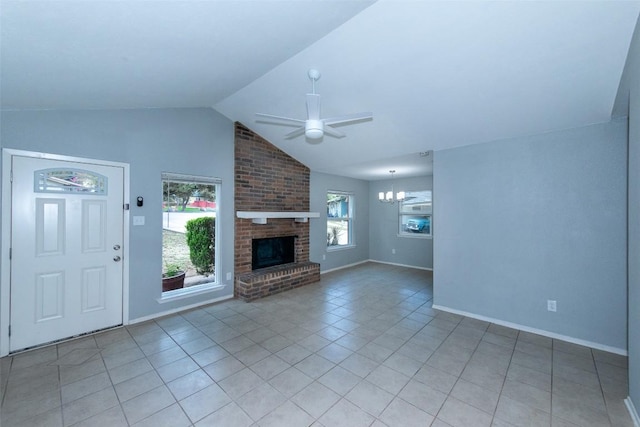 7107 Dan Jean Dr Unit A & B, Austin, TX 78745 - unfurnished living room featuring a ceiling fan, light tile patterned flooring, a chandelier, vaulted ceiling, and a fireplace
