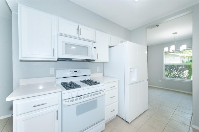 7107 Dan Jean Dr Unit A & B, Austin, TX 78745 - kitchen featuring white appliances, white cabinets, light tile patterned flooring, and light countertops