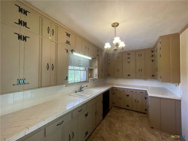 601 S Arnold St S, Lampasas, TX 76550 - kitchen with a chandelier, a textured ceiling, backsplash, cream cabinets, and pendant lighting