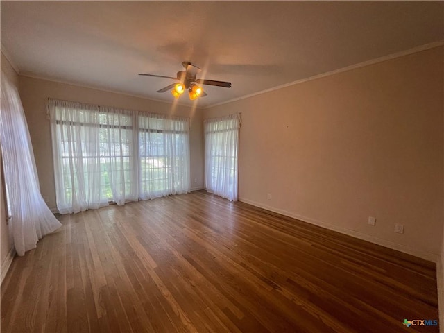 601 S Arnold St S, Lampasas, TX 76550 - empty room with a ceiling fan, wood finished floors, and crown molding