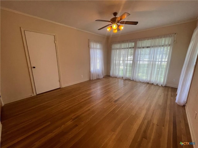 601 S Arnold St S, Lampasas, TX 76550 - empty room with wood finished floors, a ceiling fan, and crown molding