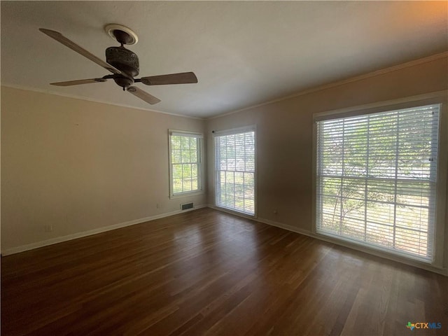 601 S Arnold St S, Lampasas, TX 76550 - spare room with crown molding, wood finished floors, and ceiling fan