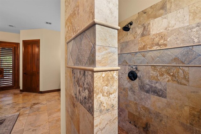307 Goodnight Dr, Georgetown, TX 78628 - bathroom view of a walk in shower and baseboards