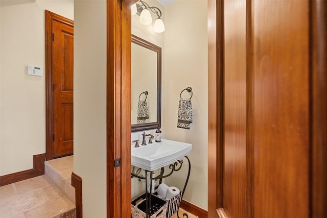 307 Goodnight Dr, Georgetown, TX 78628 - bathroom with baseboards and stone finish flooring