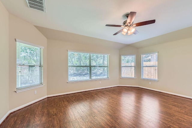 9728 Alex Ln, Austin, TX 78748 - spare room with lofted ceiling, wood finished floors, and a ceiling fan
