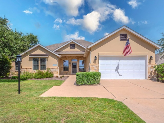 100 N Meadowlark St, Lakeway, TX 78734 - view of front facade with stone siding, stucco siding, concrete driveway, and a garage
