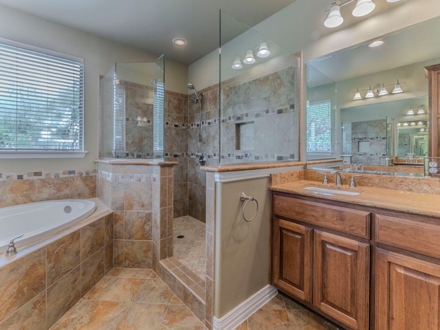 100 N Meadowlark St, Lakeway, TX 78734 - full bath with a bath, vanity, walk in shower, and tile patterned floors