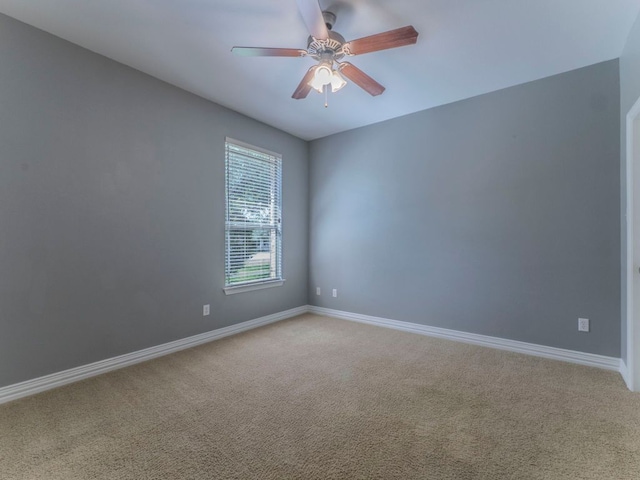100 N Meadowlark St, Lakeway, TX 78734 - spare room with light carpet and a ceiling fan