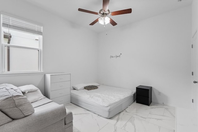 1332 Al Fresco Cv, Leander, TX 78641 - bedroom with marble look tile flooring and ceiling fan