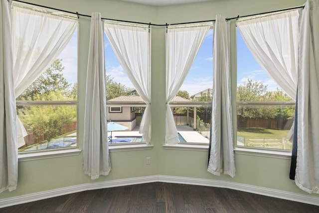 2708 Feathergrass Ct, Cedar Park, TX 78613 - unfurnished dining area with baseboards and dark wood-style flooring