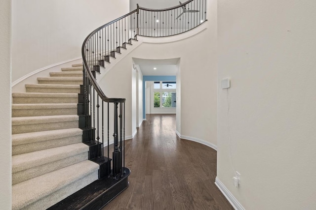 2708 Feathergrass Ct, Cedar Park, TX 78613 - entryway featuring stairway, dark wood finished floors, and a high ceiling