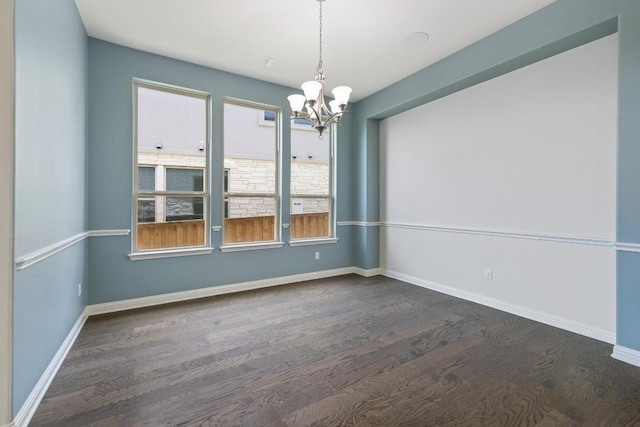 2708 Feathergrass Ct, Cedar Park, TX 78613 - spare room with dark wood-style floors and a chandelier