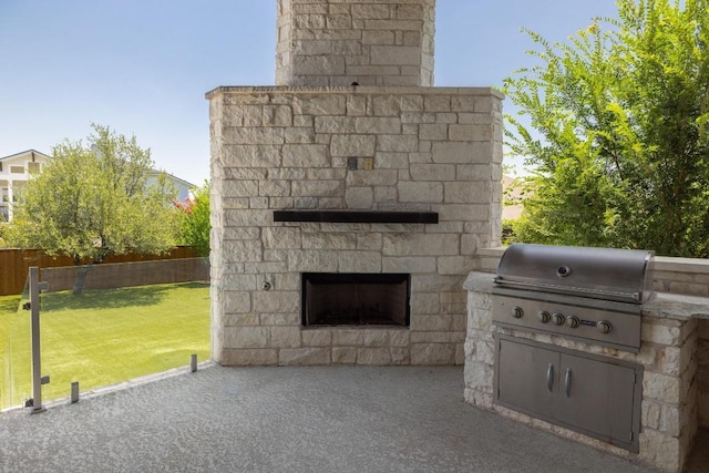 2708 Feathergrass Ct, Cedar Park, TX 78613 - view of patio / terrace with an outdoor stone fireplace and exterior kitchen