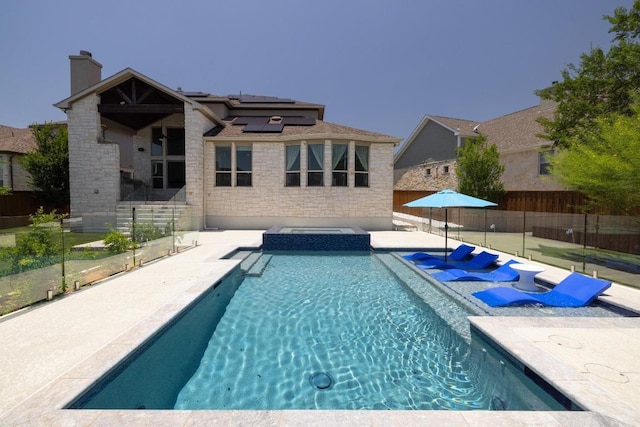 2708 Feathergrass Ct, Cedar Park, TX 78613 - view of swimming pool featuring a patio area, a fenced backyard, and a pool with connected hot tub