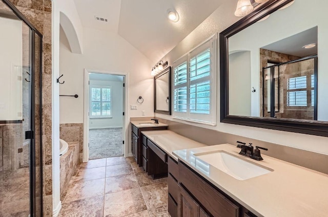 851 Catalina Ln, Austin, TX 78737 - full bathroom with a shower stall, double vanity, a bath, and lofted ceiling