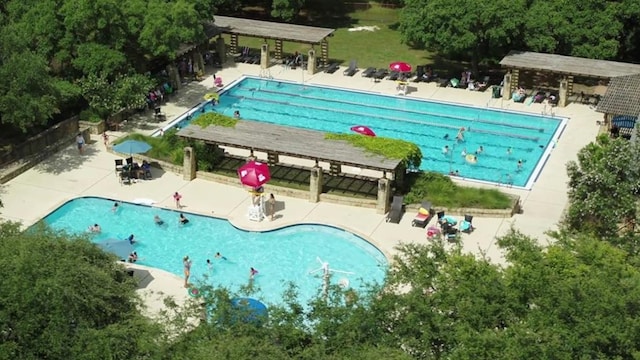 851 Catalina Ln, Austin, TX 78737 - community pool featuring a patio area