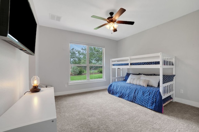 213 Woodland Hills Dr, Georgetown, TX 78633 - carpeted bedroom featuring baseboards and ceiling fan