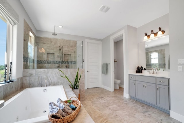 213 Woodland Hills Dr, Georgetown, TX 78633 - bathroom with a stall shower, a whirlpool tub, and vanity