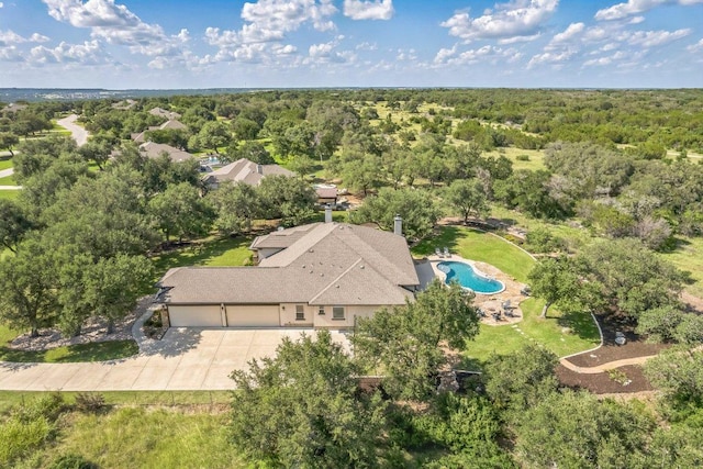 213 Woodland Hills Dr, Georgetown, TX 78633 - view from above of property featuring a forest