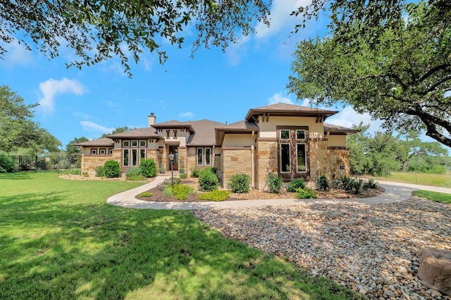 213 Woodland Hills Dr, Georgetown, TX 78633 - prairie-style home featuring stone siding, stucco siding, and a chimney