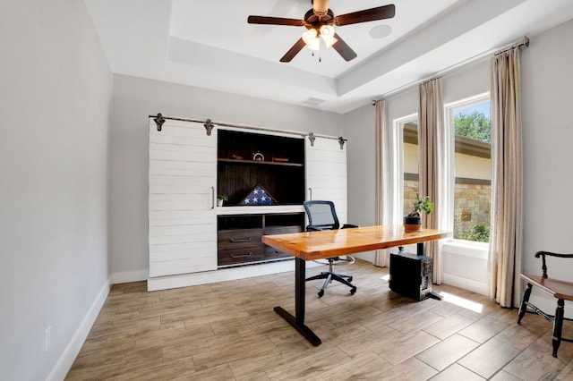 213 Woodland Hills Dr, Georgetown, TX 78633 - office with a tray ceiling, ceiling fan, and wood finished floors