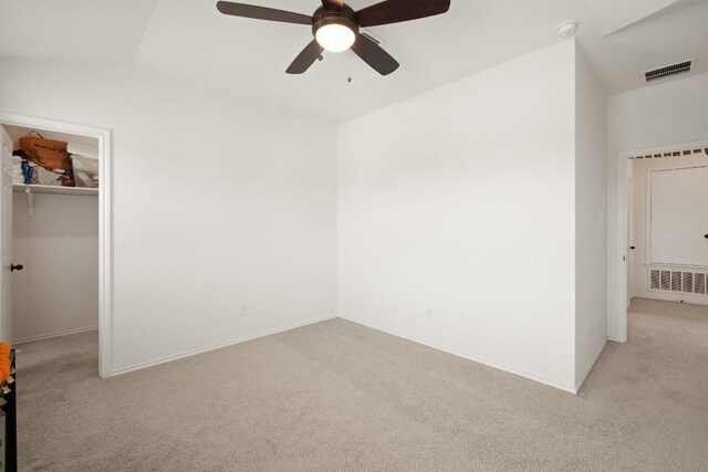 538 Thunder Valley Trl, Georgetown, TX 78626 - unfurnished bedroom with light colored carpet, a spacious closet, a closet, and ceiling fan