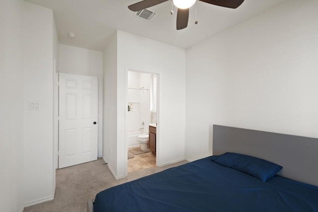 538 Thunder Valley Trl, Georgetown, TX 78626 - bedroom with light colored carpet, connected bathroom, and a ceiling fan
