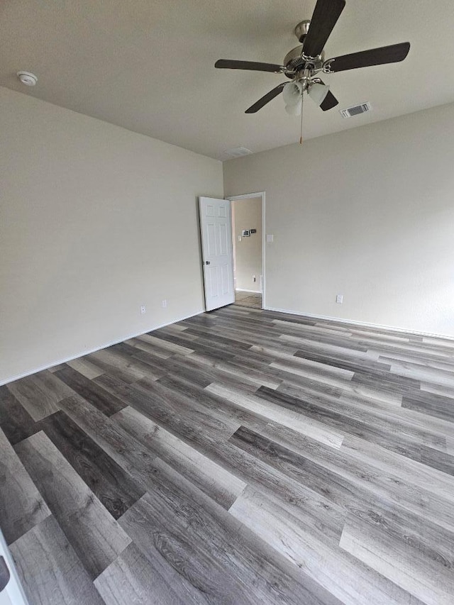 9405 Glynhill Ct, Killeen, TX 76542 - empty room featuring a ceiling fan, wood finished floors, and a smoke detector