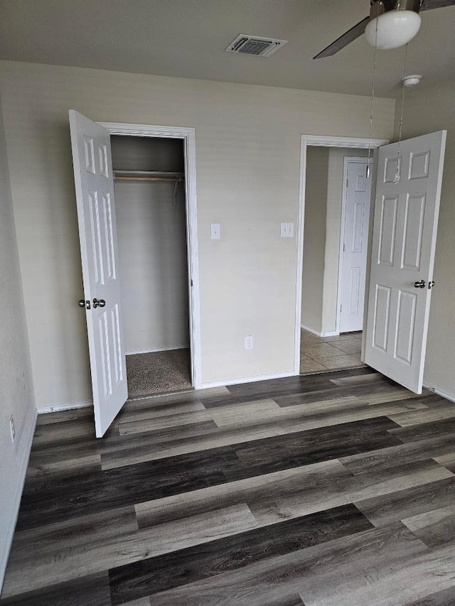 9405 Glynhill Ct, Killeen, TX 76542 - unfurnished bedroom with wood finished floors, a closet, and ceiling fan