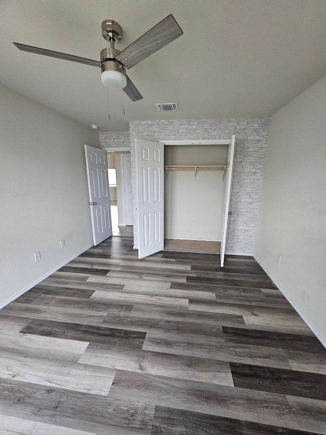9405 Glynhill Ct, Killeen, TX 76542 - unfurnished bedroom featuring wood finished floors, a closet, and ceiling fan
