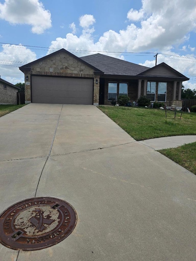 9405 Glynhill Ct, Killeen, TX 76542 - ranch-style home featuring a front yard, an attached garage, and driveway