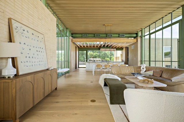 4506 Chiappero Trl, Austin, TX 78731 - common area featuring wooden ceiling and a wall of windows