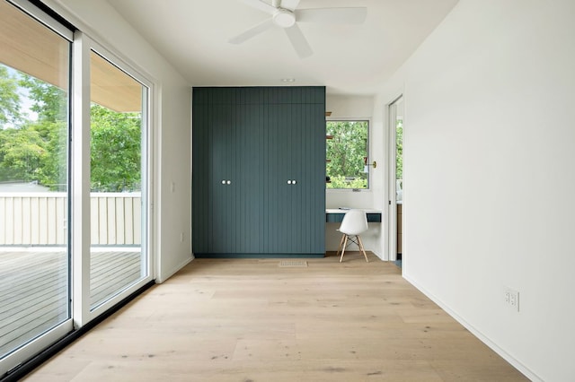 4506 Chiappero Trl, Austin, TX 78731 - unfurnished room featuring light wood finished floors and a ceiling fan