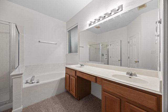 716 Bent Wood Pl, Round Rock, TX 78665 - full bathroom featuring a shower stall, double vanity, and a garden tub