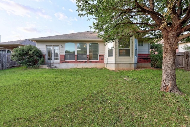 716 Bent Wood Pl, Round Rock, TX 78665 - rear view of house featuring french doors