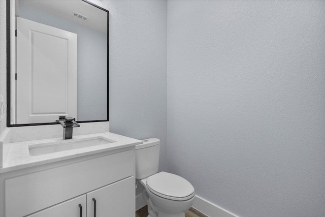 103 W Pauwela Ln, Bastrop, TX 78602 - bathroom with vanity and a textured wall