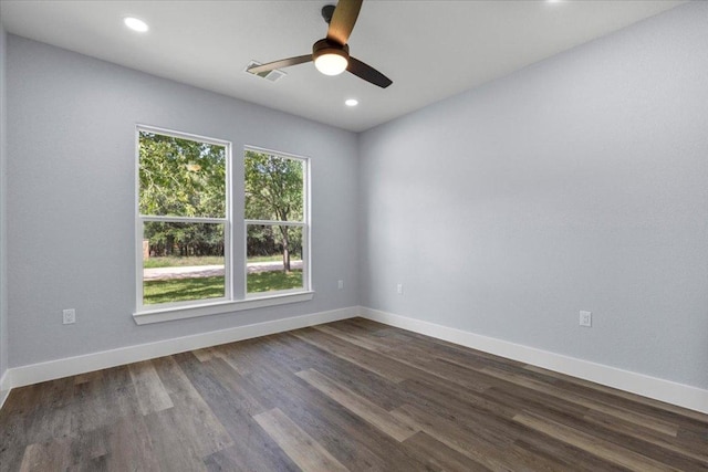 103 W Pauwela Ln, Bastrop, TX 78602 - spare room with a ceiling fan, dark wood-type flooring, and recessed lighting