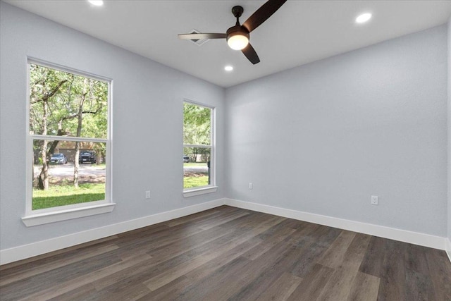 103 W Pauwela Ln, Bastrop, TX 78602 - spare room with a ceiling fan, dark wood-style flooring, and recessed lighting