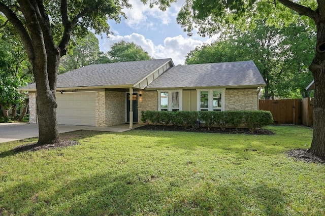 2508 Baxter Dr, Austin, TX 78745 - ranch-style home with stone siding, a garage, a shingled roof, and concrete driveway