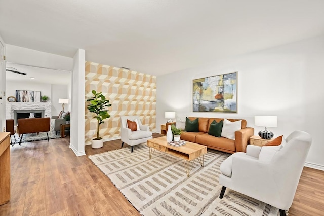 2508 Baxter Dr, Austin, TX 78745 - living room featuring wood finished floors and a fireplace