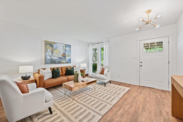 2508 Baxter Dr, Austin, TX 78745 - living area with light wood-style floors and a chandelier