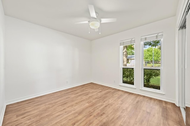 2508 Baxter Dr, Austin, TX 78745 - spare room with light wood finished floors and ceiling fan