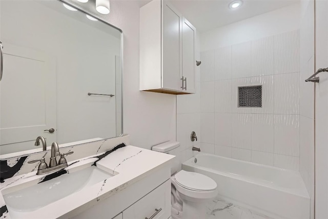 343 Nene Ln, Bastrop, TX 78602 - bathroom featuring vanity, shower / bath combination, and marble finish flooring