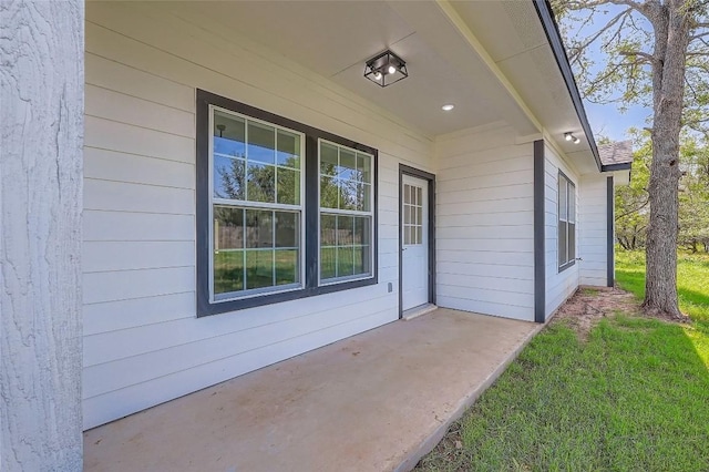 343 Nene Ln, Bastrop, TX 78602 - view of exterior entry with a porch