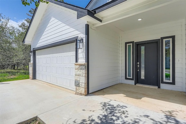343 Nene Ln, Bastrop, TX 78602 - garage with concrete driveway
