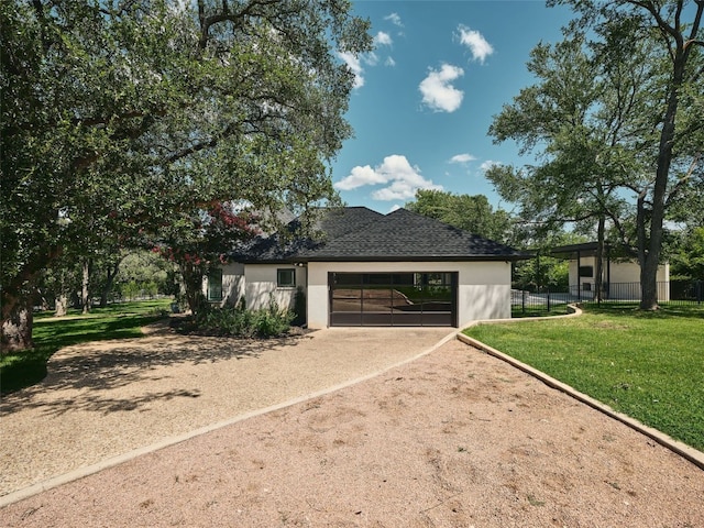 4105 Mcbrine Pl, Austin, TX 78746 - view of front of house with driveway, stucco siding, a garage, and a shingled roof