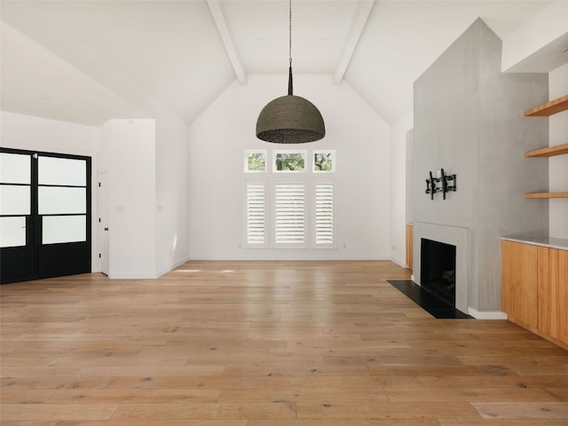 4105 Mcbrine Pl, Austin, TX 78746 - unfurnished living room with beamed ceiling, light wood-style flooring, high vaulted ceiling, and a fireplace with flush hearth