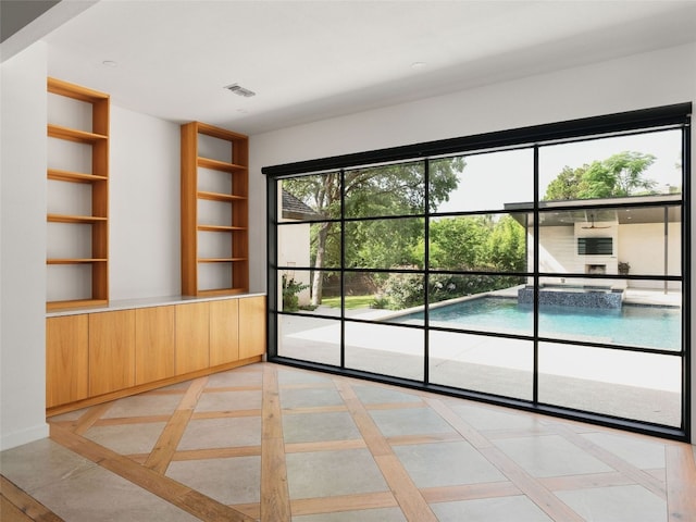 4105 Mcbrine Pl, Austin, TX 78746 - unfurnished room with inlaid floor details