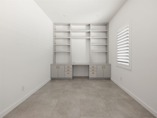 4105 Mcbrine Pl, Austin, TX 78746 - unfurnished office featuring baseboards and built in desk