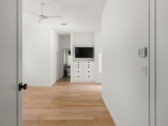 4105 Mcbrine Pl, Austin, TX 78746 - corridor featuring light wood finished floors and baseboards